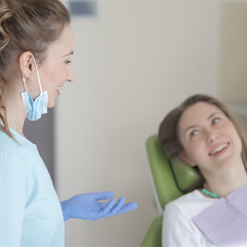 A dental team member providing gentle, unhurried care